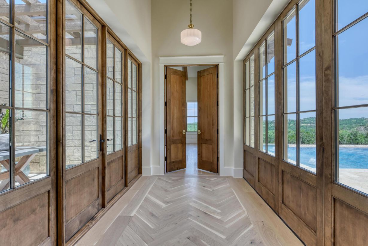 This gorgeous home has 7 bedrooms, 7 ensuite bathrooms, 2- ½ baths and a 4-car garage, Waring, Welfare, Texas